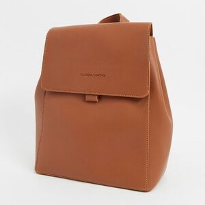 Claudia Canova Unlined Flapover Backpack Tan Faux Leather Minimalist